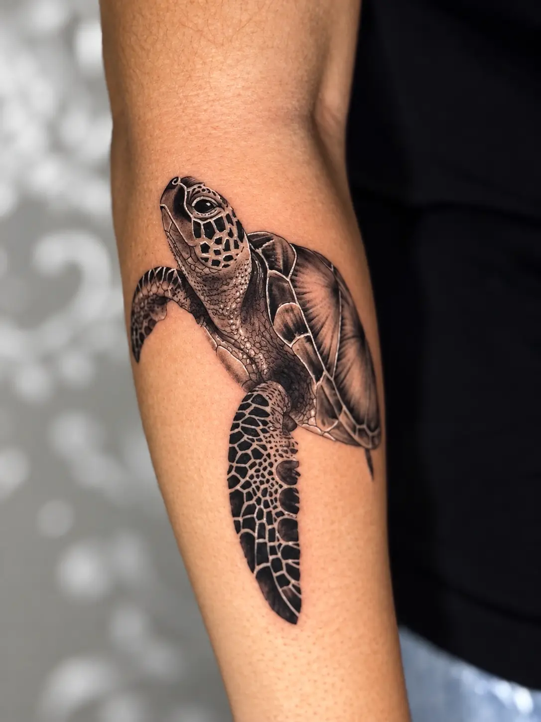 Tatuagem micro-realista de tartaruga