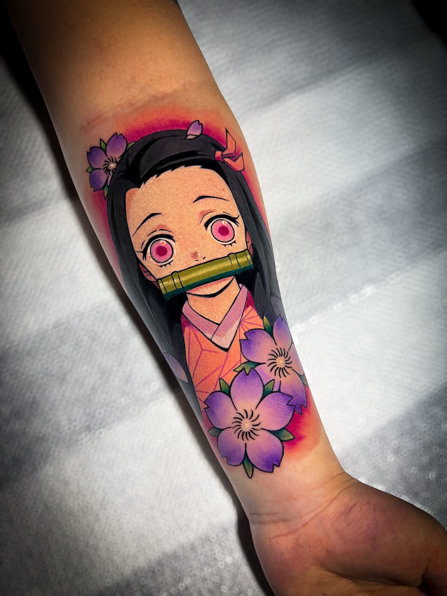Tatuagem anime colorida da Nezuko