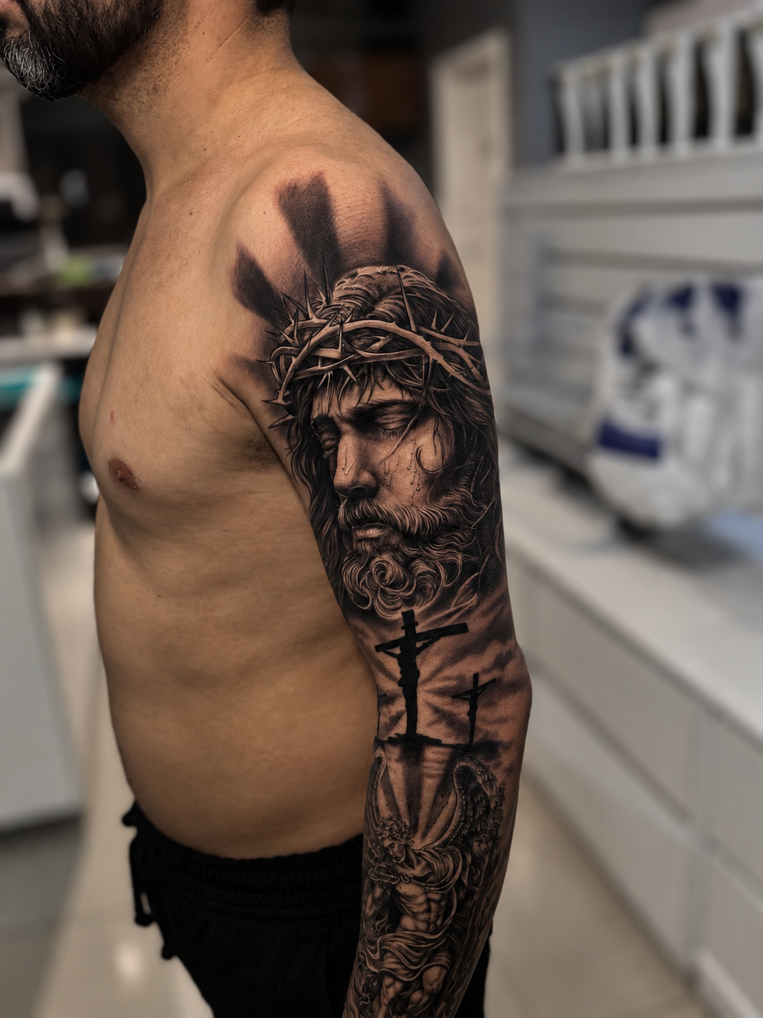 Tatuagem realista de Jesus